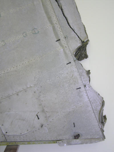 rear portion of the 707 wingtip showing lightning damage