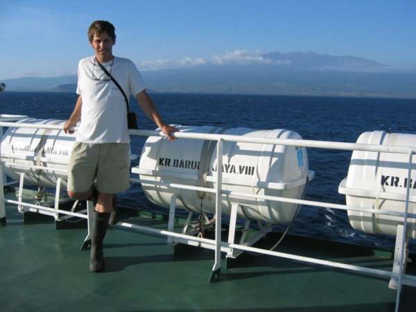Brad Linsley on the Indonesian ship R.V. Baruna Jaya VIII in Teluk Saleh with Tambora in background